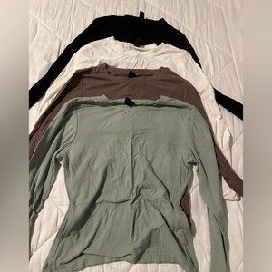 Four ribbed long sleeve stretch tops L